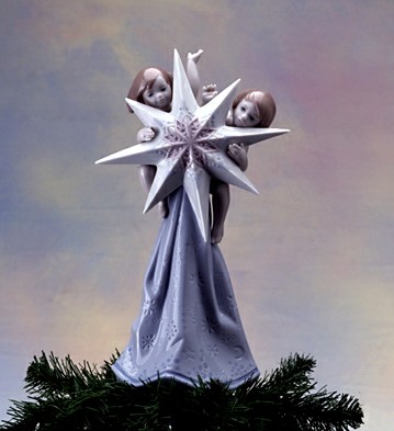A CELESTIAL CHRISTMAS-2000 TREE TOPPER by Lladro Image is watermarked for copyright protection and is not present on the actual art work.