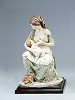 Mother Breast Feeding by Armani