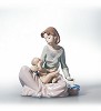 Dressing The Baby by Retired Lladro