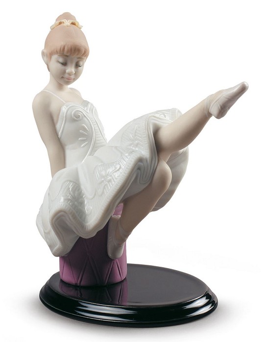 Lladro The essay begins Porcelain Figurine