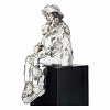 Silver Sitting Clown Statue
