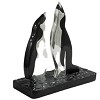 Silver Singing Penguins Statue