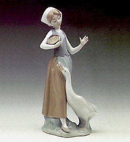 Girl With Duck 1969-99 by Lladro Image is watermarked for copyright protection and is not present on the actual art work.