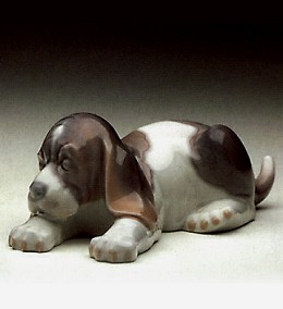 Beagle Puppy Lying 1969-91 by Lladro Image is watermarked for copyright protection and is not present on the actual art work.