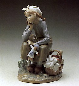 Dutch Girl With Doll 1972-84 by Lladro Image is watermarked for copyright protection and is not present on the actual art work.