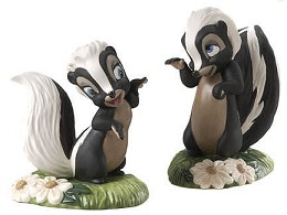 Bambi Flower And Miss Skunk Walking On Air And Knocked For A Loop by WDCC Disney Classics Image is watermarked for copyright protection and is not present on the actual art work.