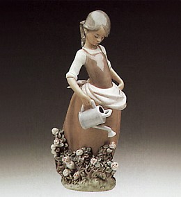 Girl With Watering Can 1977-88 by Lladro Image is watermarked for copyright protection and is not present on the actual art work.