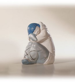 Eskimo Boy  White/dec. by Lladro Image is watermarked for copyright protection and is not present on the actual art work.