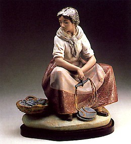 Fisherwoman 1978-85 by Lladro Image is watermarked for copyright protection and is not present on the actual art work.