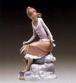At The Seaside 1974-85 by Lladro Image is watermarked for copyright protection and is not present on the actual art work.