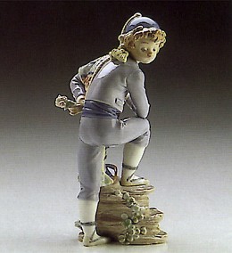 Valencian Boy 1986-91 by Lladro Image is watermarked for copyright protection and is not present on the actual art work.