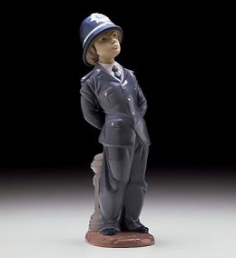 Little Policeman 1997-00 by Lladro Image is watermarked for copyright protection and is not present on the actual art work.