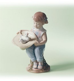 What A Surprise by Lladro Image is watermarked for copyright protection and is not present on the actual art work.