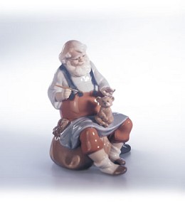 Santa's Magic Touch by Lladro Image is watermarked for copyright protection and is not present on the actual art work.