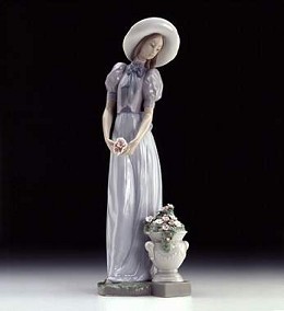 Blossom Of The Heart by Lladro Image is watermarked for copyright protection and is not present on the actual art work.