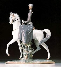 Female Equestrian by Lladro Image is watermarked for copyright protection and is not present on the actual art work.