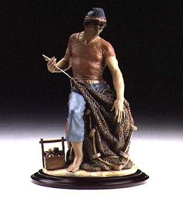 Man Of The Sea by Lladro Image is watermarked for copyright protection and is not present on the actual art work.