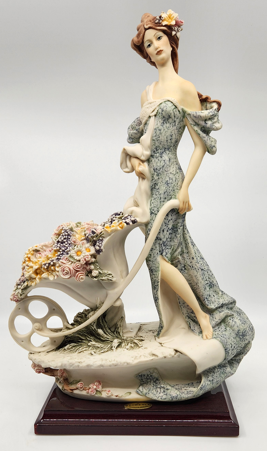 Giuseppe Armani Lady With Flower Cart 1119C Open Edition Sculpture.